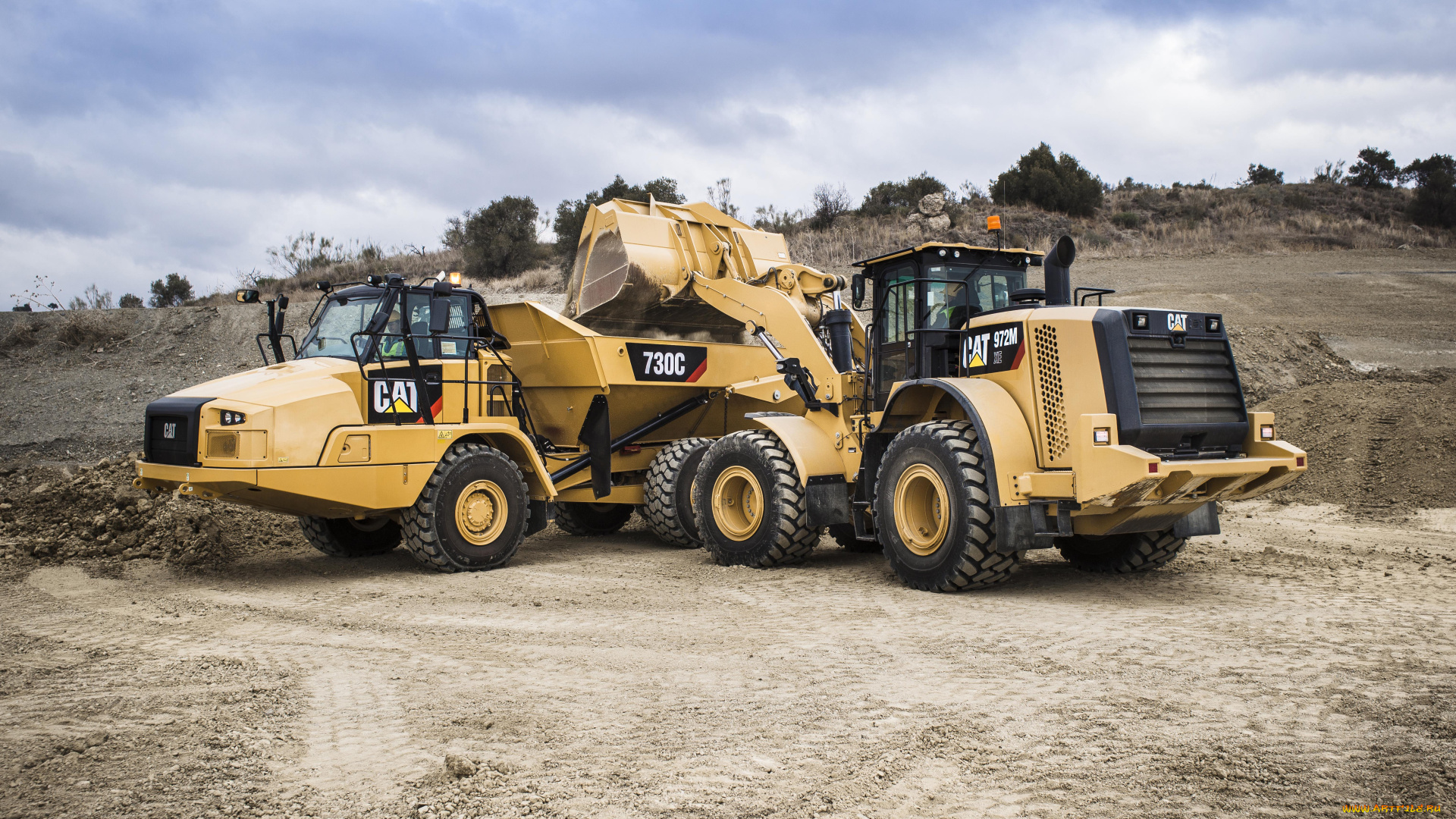 Сат авто. Cat 972m xe. Самосвал Caterpillar 730c. Caterpillar 972m xe. Катерпи.