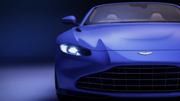 Картинка aston+martin+vantage+roadster автомобили фрагменты+автомобиля голубой