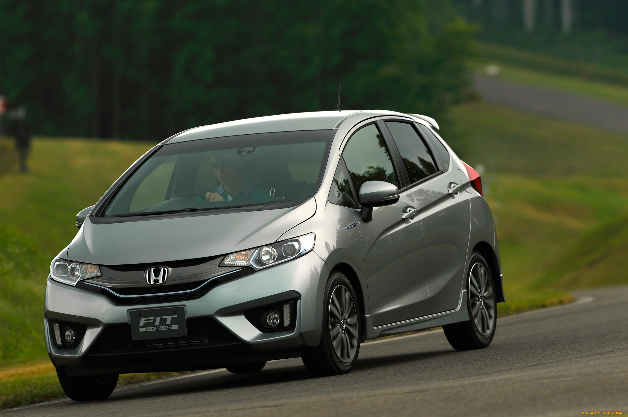 Honda старт. Хонда фит 2015 гибрид. Honda Fit 2013 Hybrid. Хонда фит 3 поколения. Honda Fit 2015 LX.