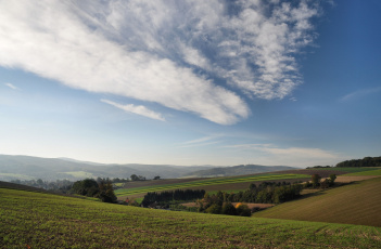 Картинка природа пейзажи небо облака поля деревья холмы австрия