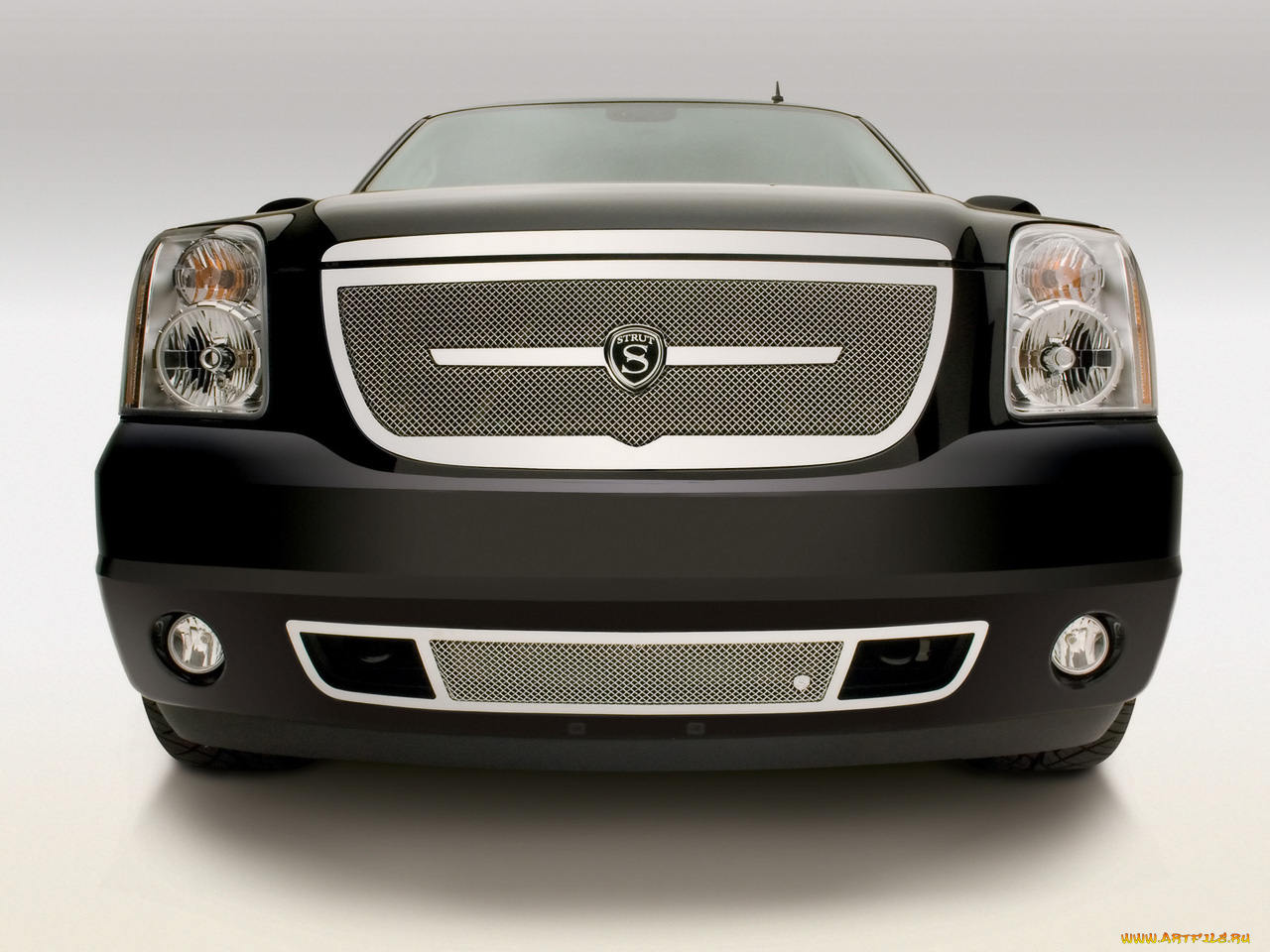 Gm авто. Фары GMC Yukon. Strut GMC Yukon Denali Mammoth collection. Strut автомобиль.